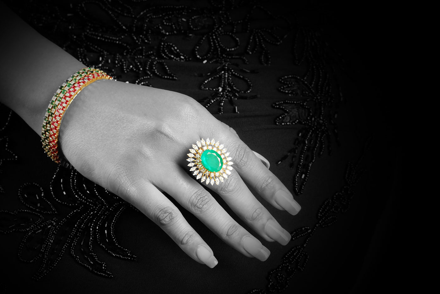 Ruby and emerald studded diamond bangles are perfect for all occasions.