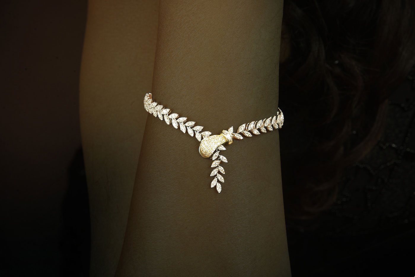 Marquise shaped diamond studded bracelet is adjustable and perfect for all wrist size.